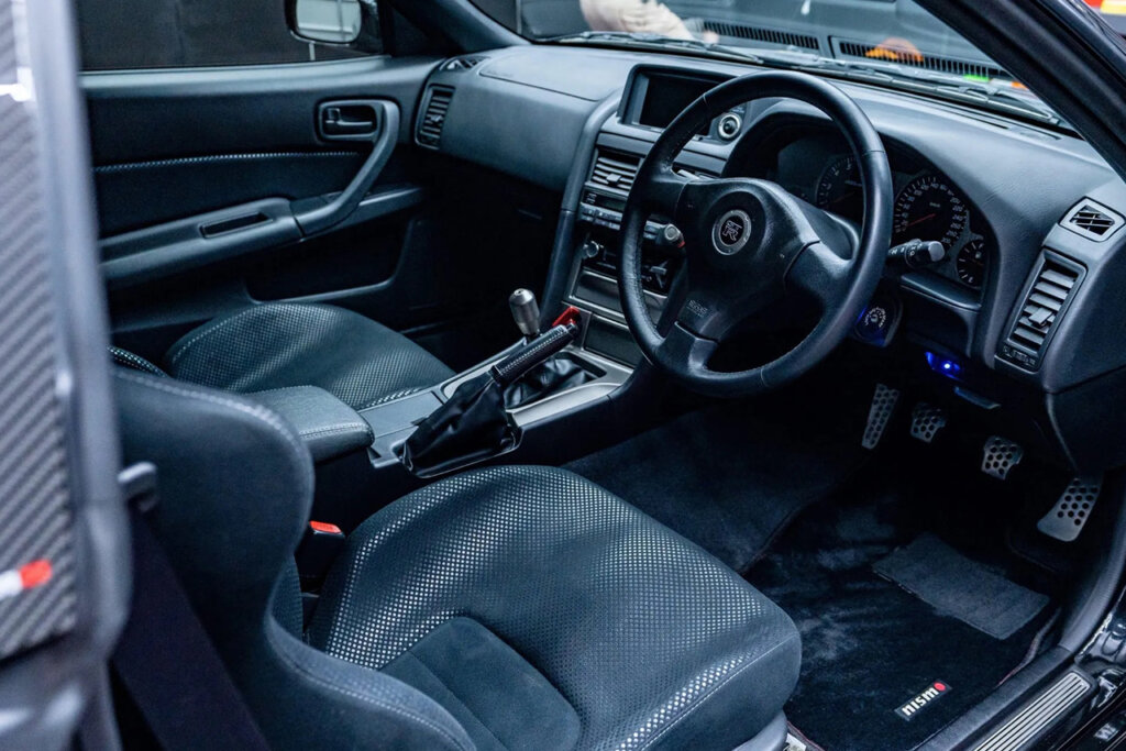 restored interior, dark gray steering wheel and seats