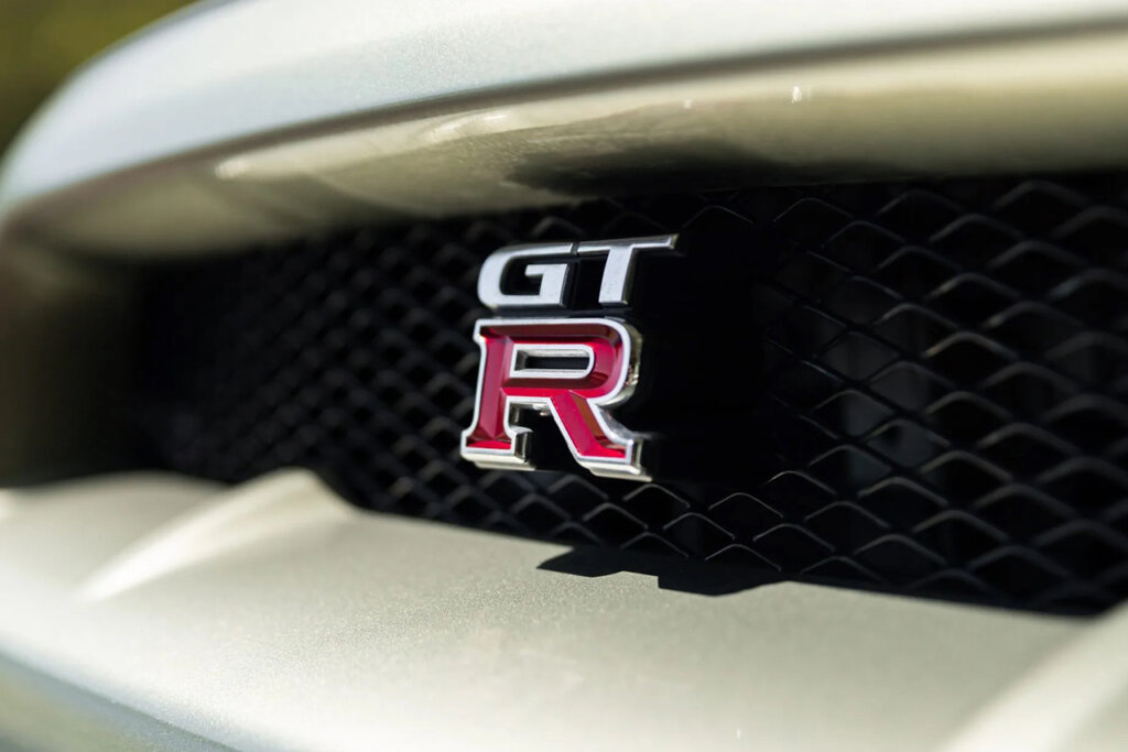 GTR badge with green car