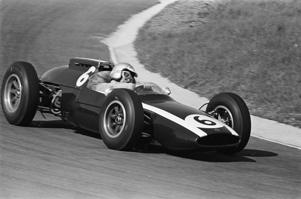 bruce mclaren racing in a mclaren f1 car