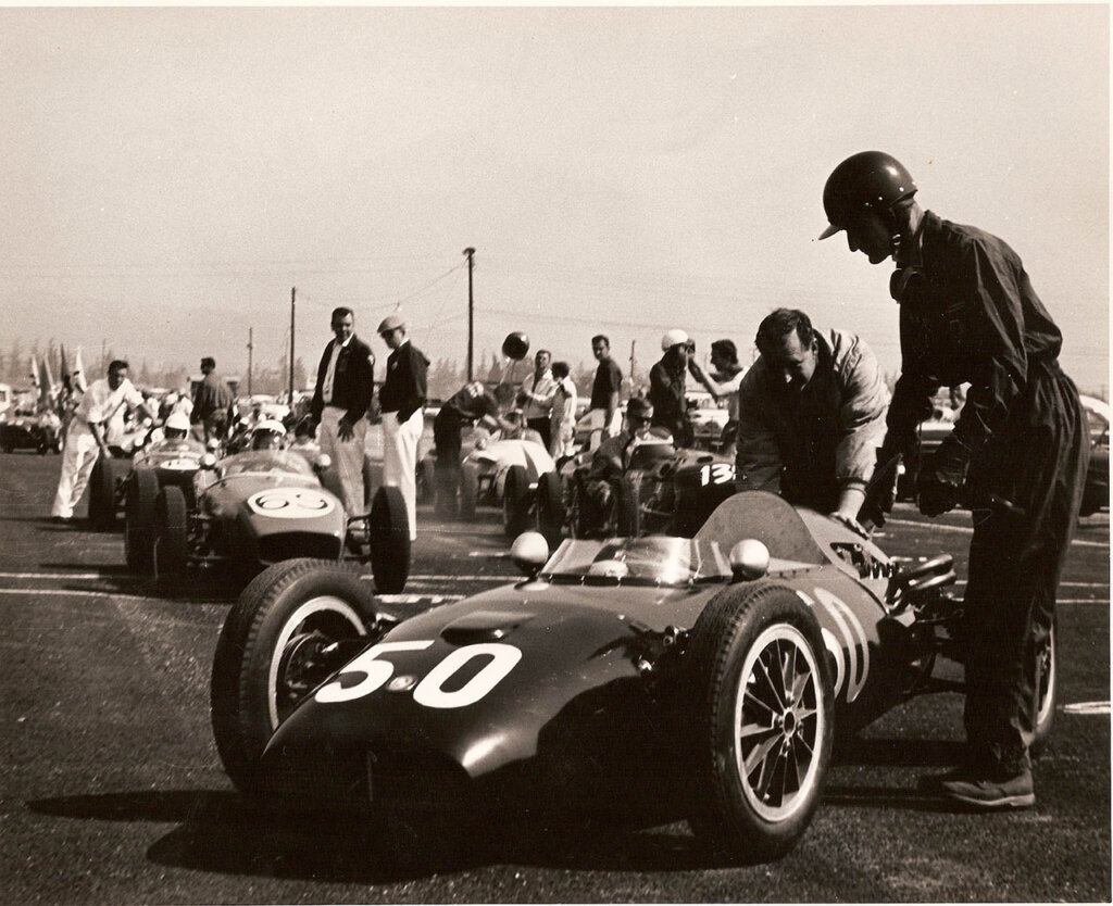 Ken Miles stepping into Dolphin Mk.2, March 1961.
