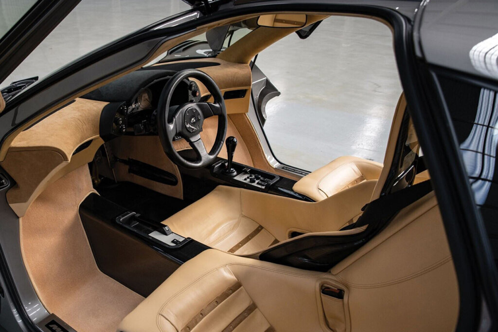 Tan interior of an LM McLaren F1 parked in a garage