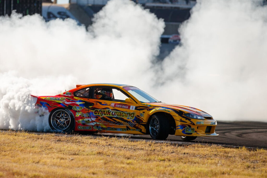 S15 Enjuki Racing Forumla Drift Racecar drifting through a turn with tons of smoke