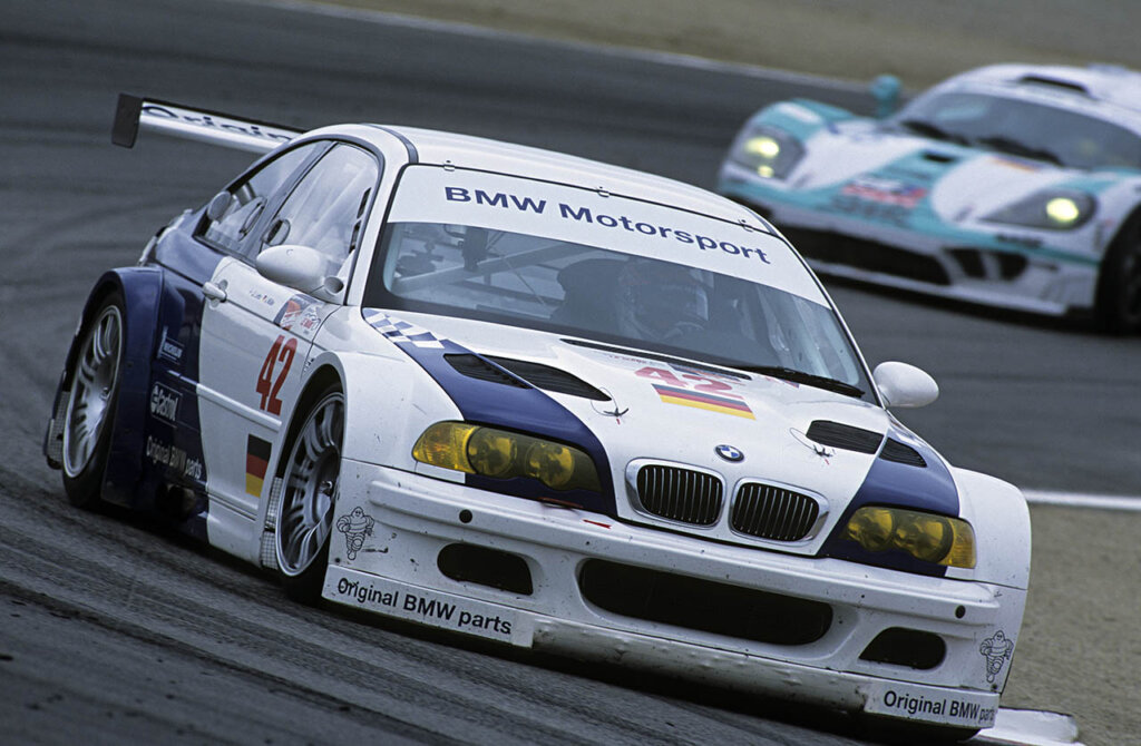 white bmw e36 m3 gtr on a racetrack