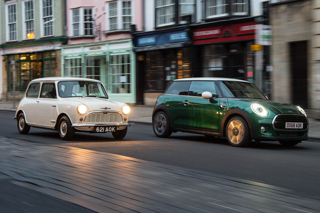 white 1959 morris mini minor and green mini cooper ion urban street