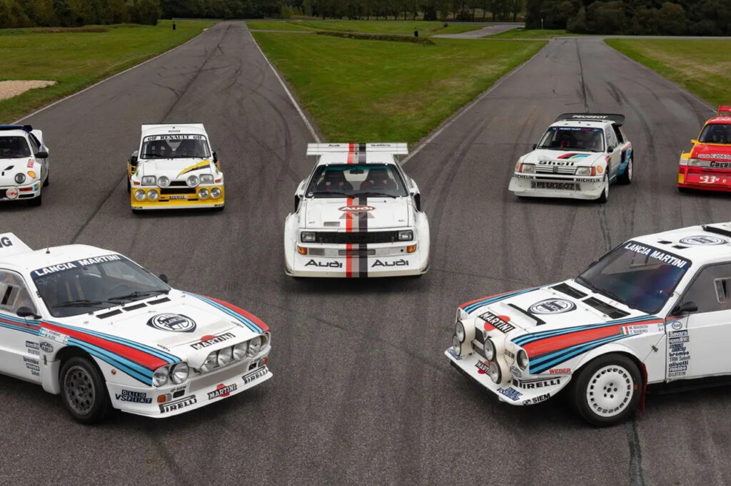 Group of cars with various liveries parked next to one another