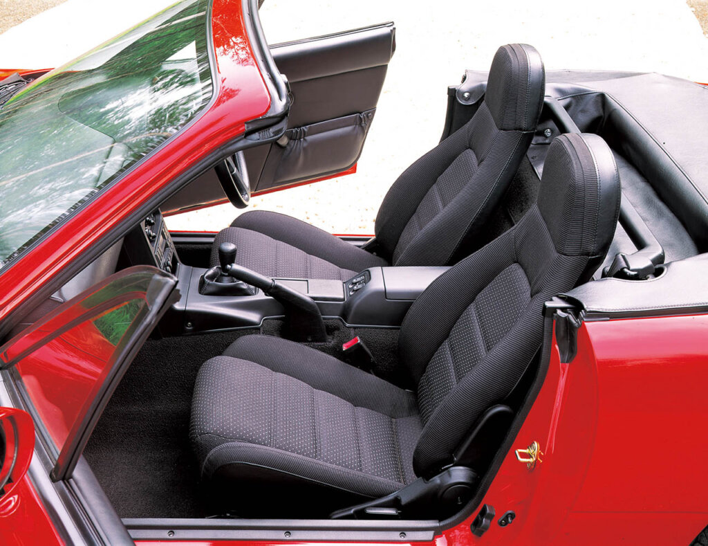 interior of a first gen red mx-5