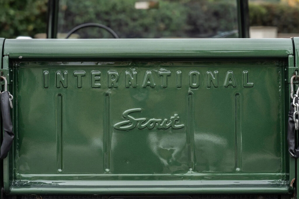 Green Scout 800 trunk tail gate stamped with the words International and Scout