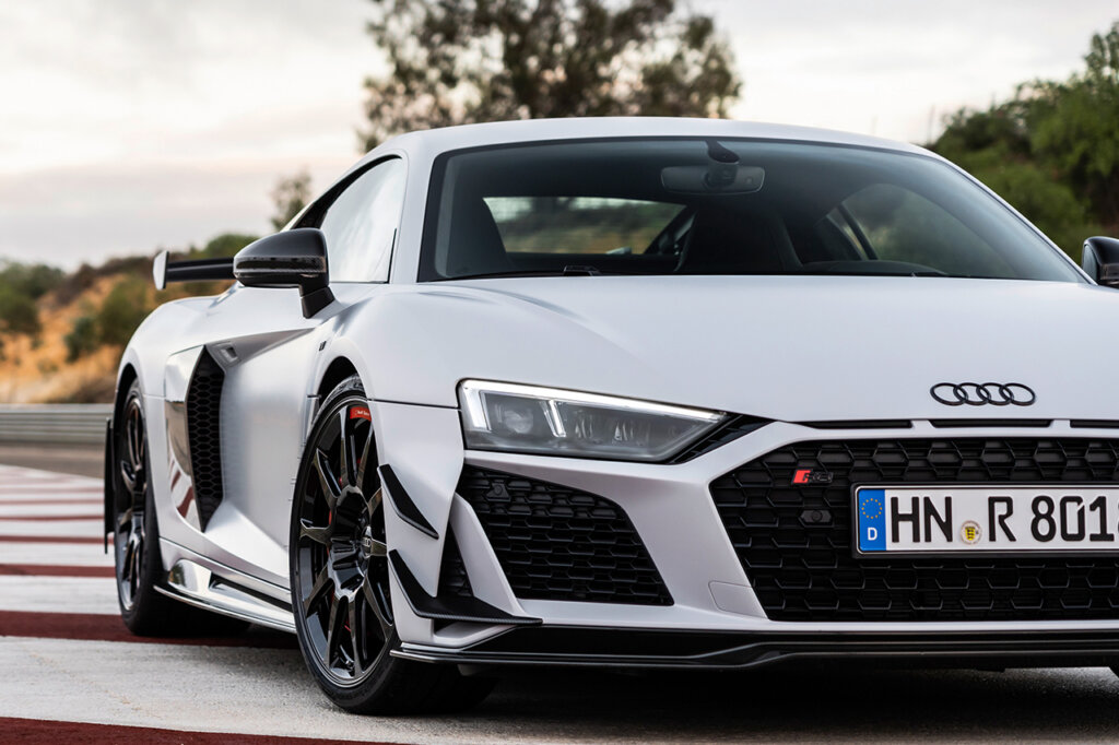 White R8 parked on a racetrack