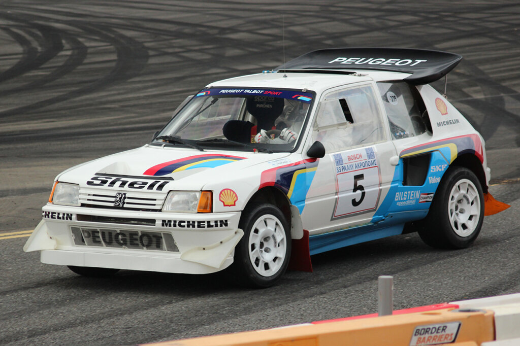 White Peugeot T16 parked on a racetrack