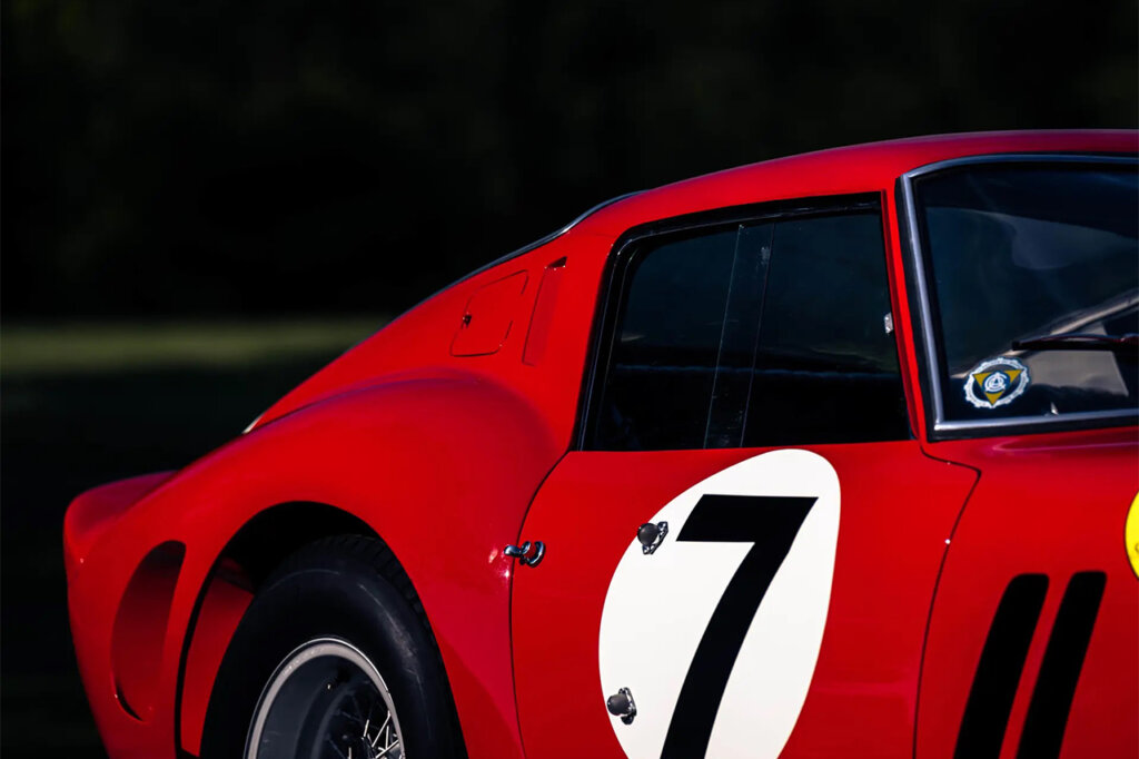 Red rear quarter panel with a large number 7 in a white circle on the door