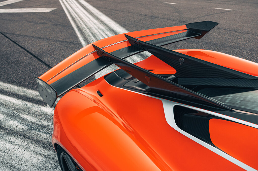 rear end of spoiler wing on an orange jesko attack