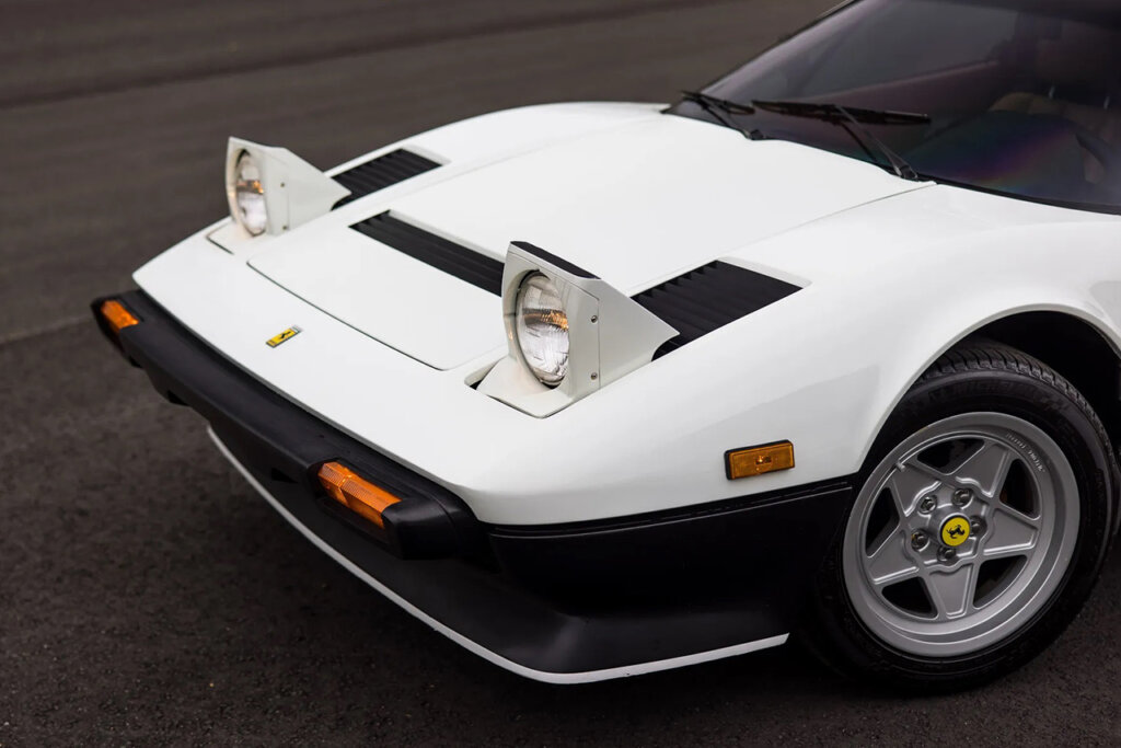 Black and white Ferrari with pop up headlights