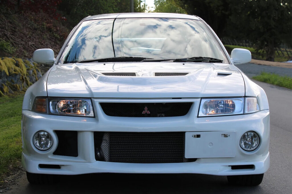 Front end of an Evo VI with two circular fog lights on the front bumper