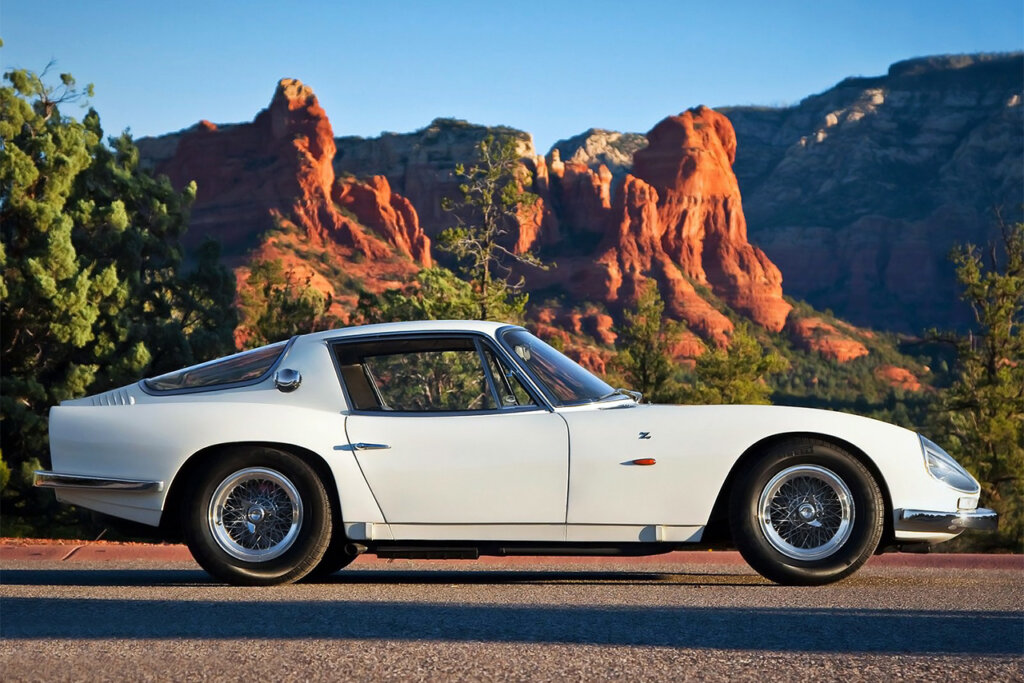 White Lamborghini 3500 GTZ parked on the road with red rock structures in background