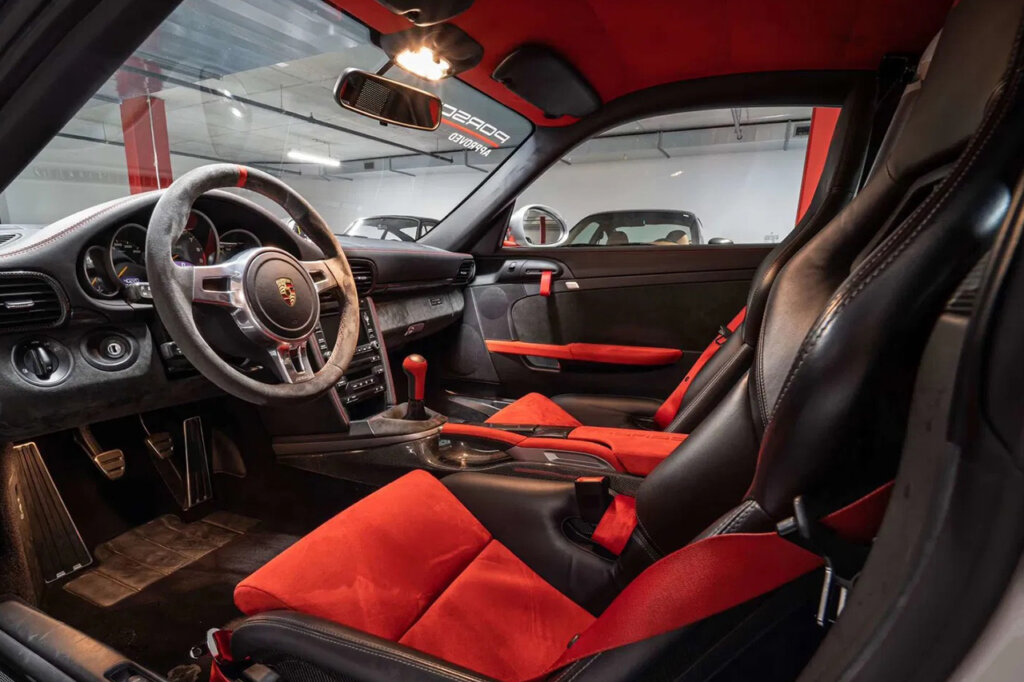 Black and orange alacantara suede seats of a 997 GT3 RS 4.0 car