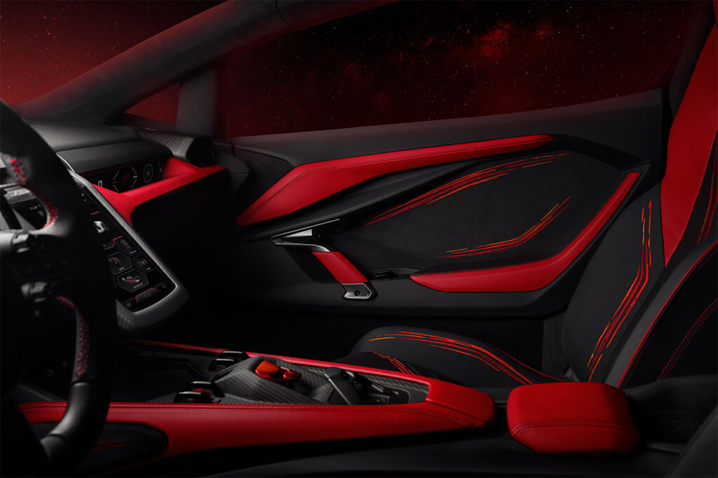 Red and black interior door car and center console of a Lamborghini Revuelto Opera Unica.