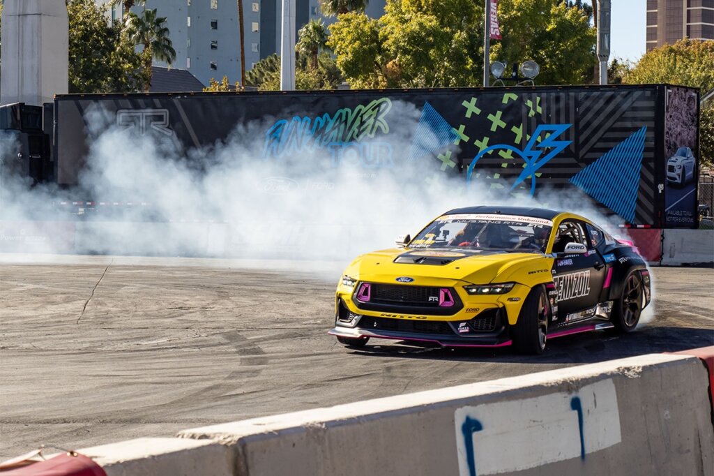 yellow black pennzoil formula drift ben hobson ford mustang drifting at sema