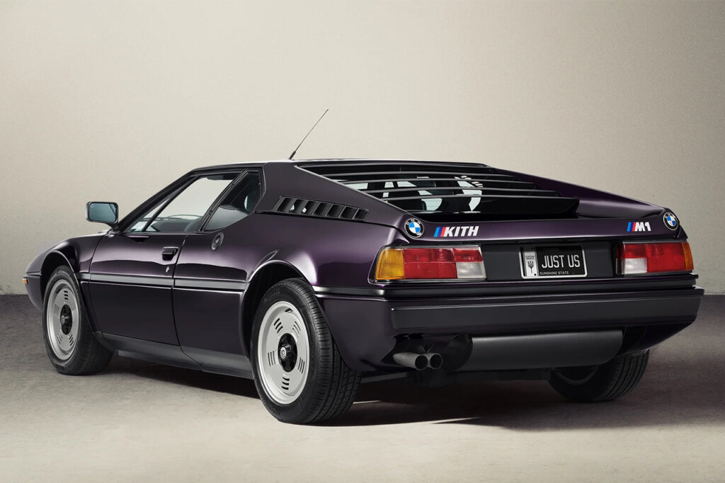 Techno Violet BMW M1 E26 by Ronnie Fieg & KITH shot looking at rear 3/4 direction with KITH badging and BMW badging along the top of the rear bumper