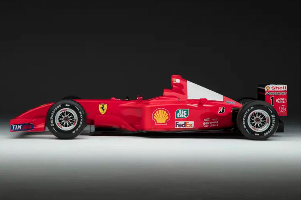 side view of Schumacher red ferrari f2001 chassis 211 f1 car