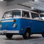 blue and white Volkswagen t2 bus