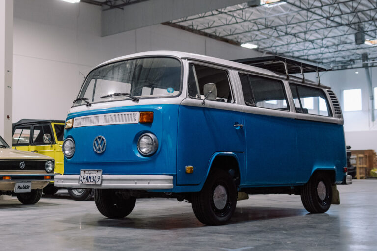 blue and white Volkswagen t2 bus