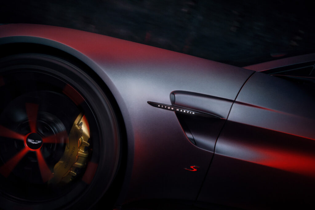 side close up of silver aston martin vantage s