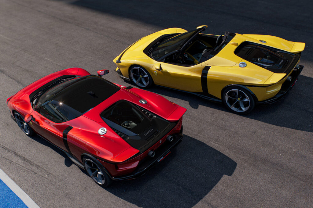 rear top view of red ferrari 849 testarossa and yellow ferrari 849 testarossa spider