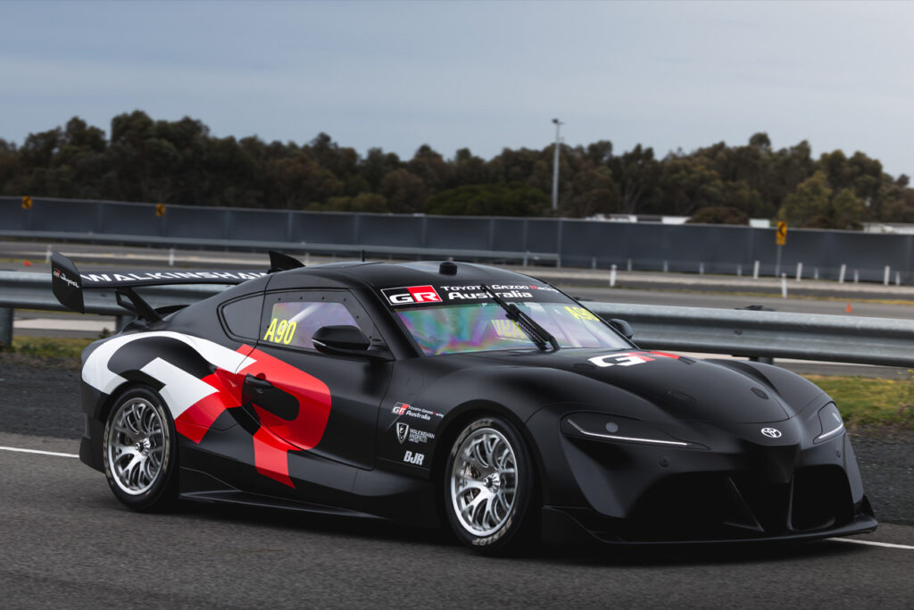 Gray Toyota GR Supra Supercar on racetrack
