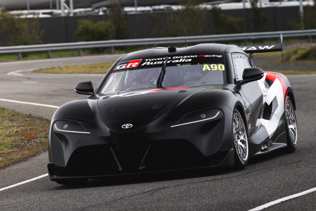 Gray Toyota GR Supra Supercar on racetrack