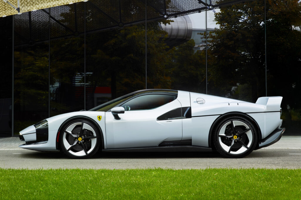 side view of white ferrari sc40