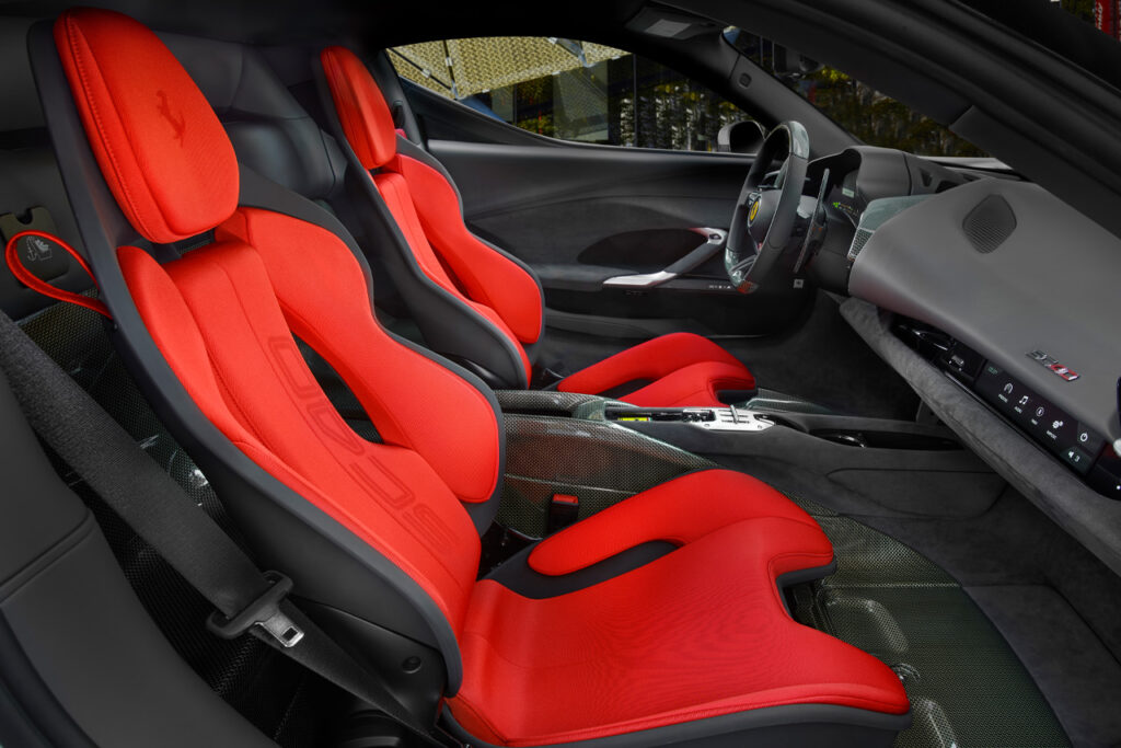seats of white ferrari sc40