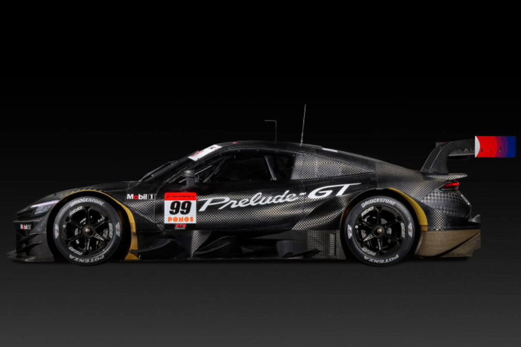 side view of black honda prelude gt500