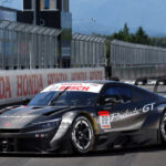 black honda prelude gt500 on race track