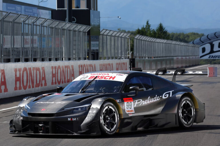 black honda prelude gt500 on race track