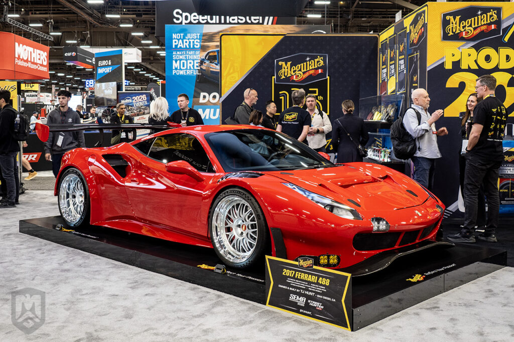 red ferrari 488 in Meguiar's booth 22357 ay sema 2025