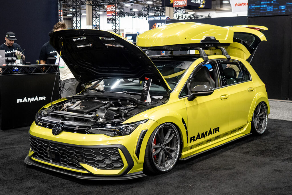 green volkswagen golf gti ramair booth 23355 at sema 2025