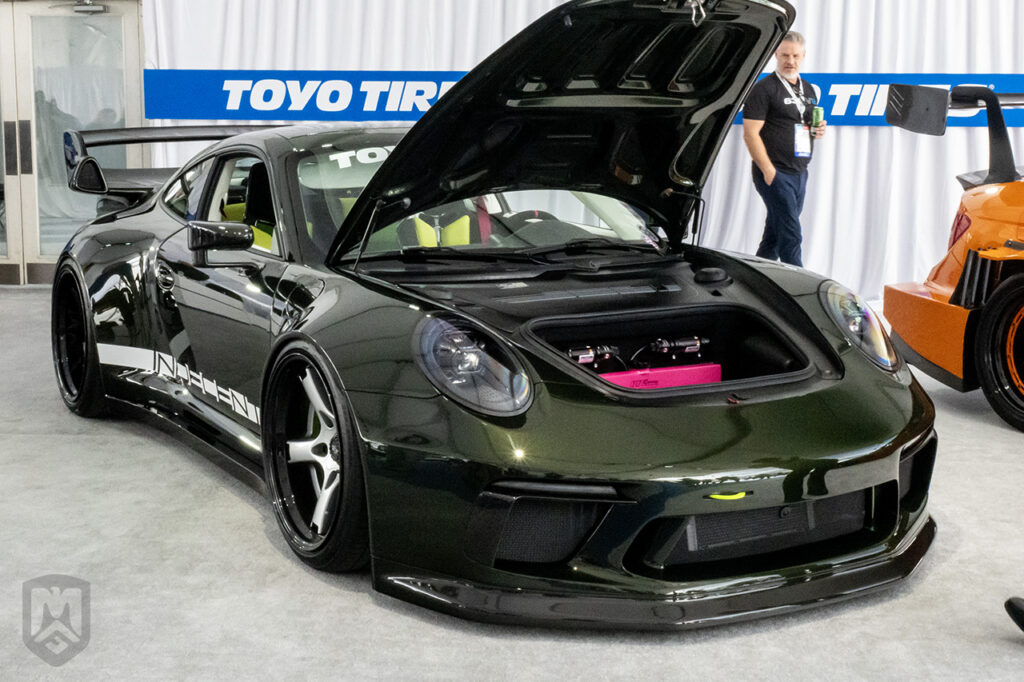 the.indecent green porsche 911 991 Indecent #014 in the toyo tires treadpass at sema 2025