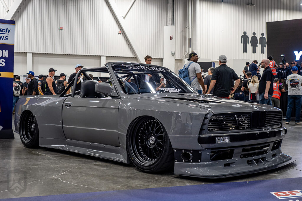 cam.cocalis bmw m3 e30 conversion in lincoln electric booth #23411 at sema 2025 central hall