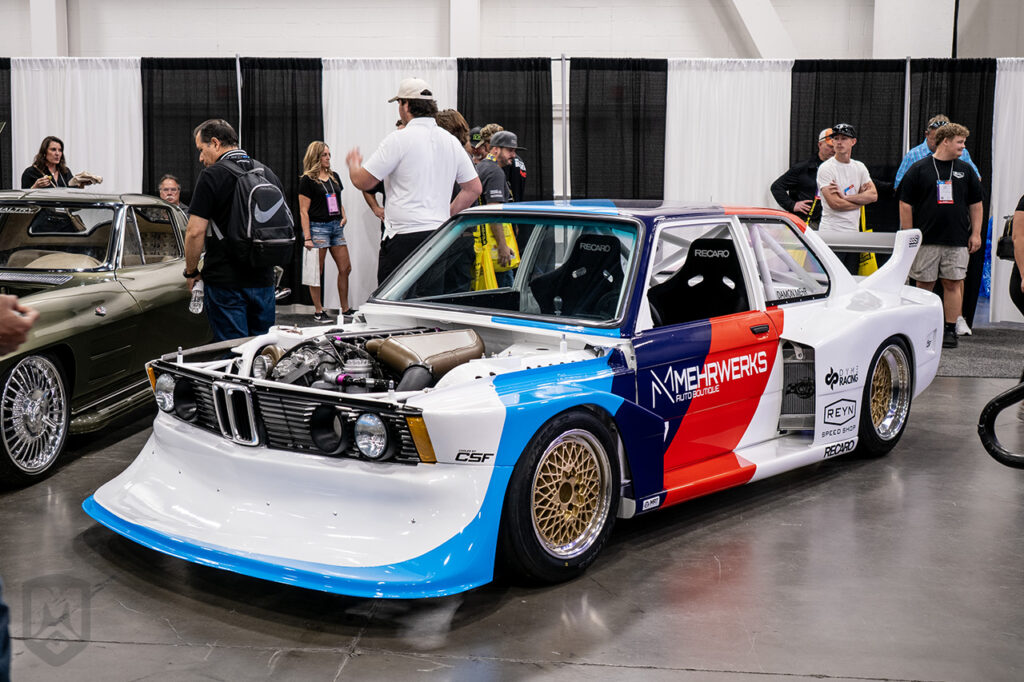white 1981 bmw 320 group 5 racecar at sema 2025 