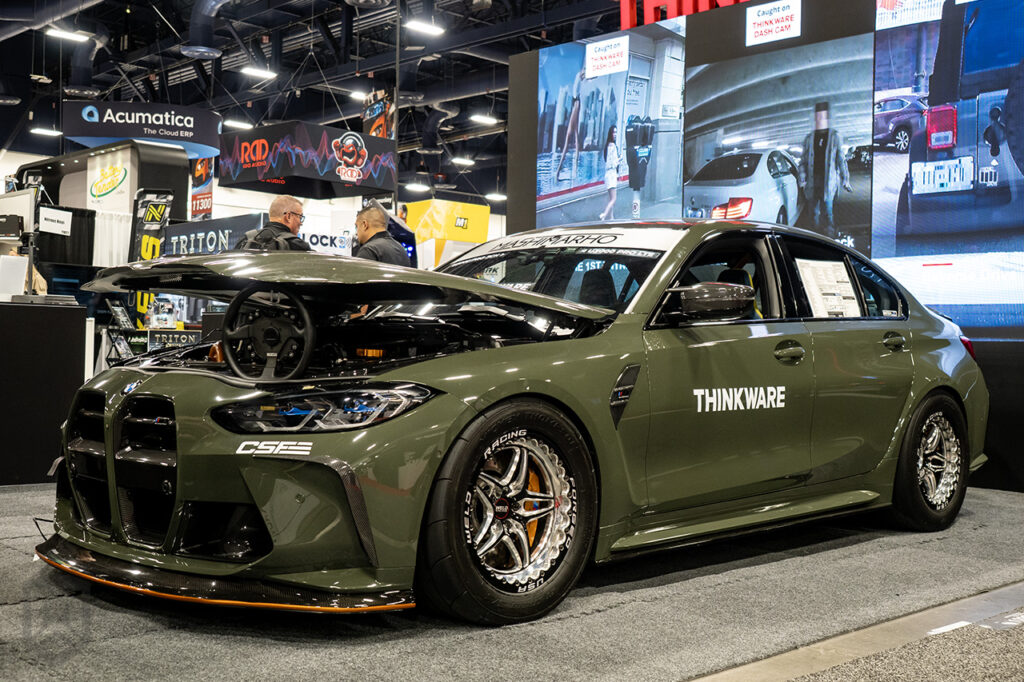 sean_rho green bmw m3 in the thinkware booth #10923 at sema 2025 north hall