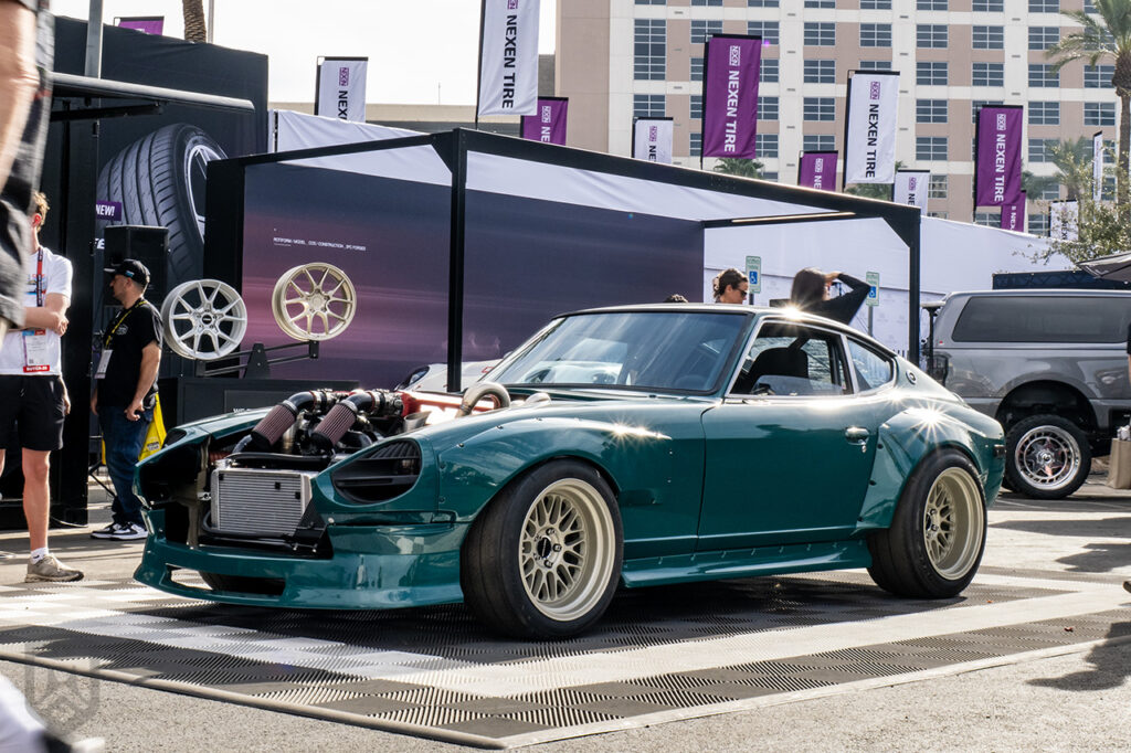 bradbuilds green viper v10 powered 1971 datsun 240z in the hoonigans booth at sema 2025