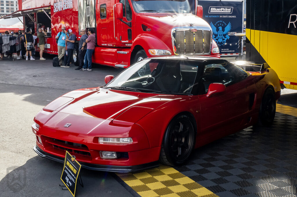 dustiinw red honda nsx inmeguiars booth at sema 2025