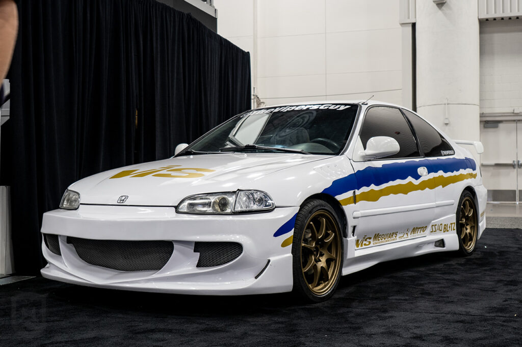 thevipersguy white honda civic in SPARQ booth 10969 at 2025 sema north hall