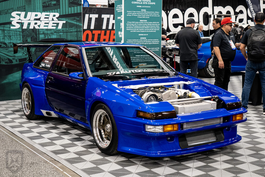 autofashion_usa blue toyota corolla ae86 trueno in motortrend booth 22553 at 2025 sema