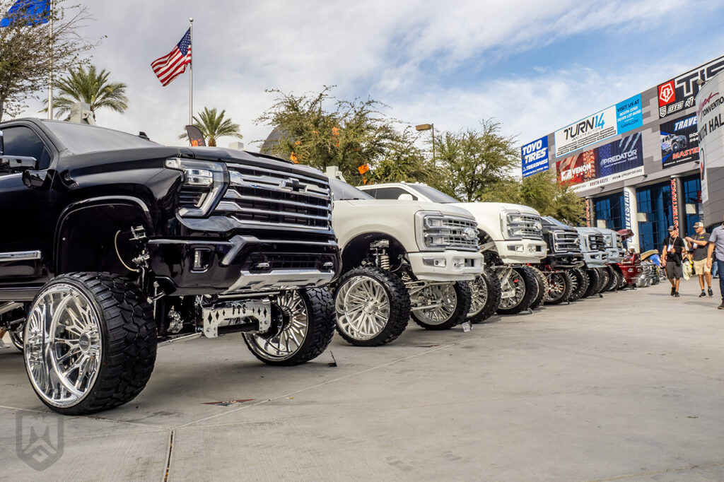 brodozer style chevy and ford trucks outside of sema 2025