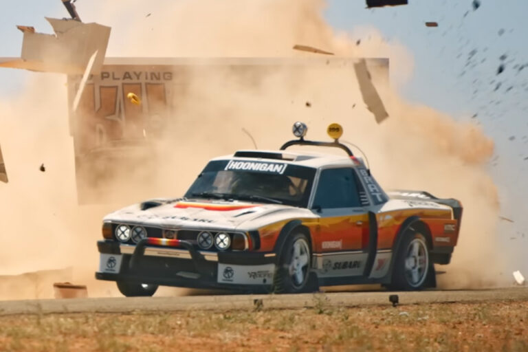 Hoonigan Subaru brat crashing through sign