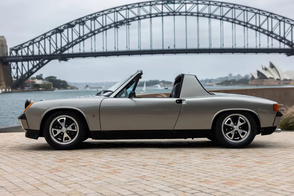 side view of 70th anniversary liquid silver 1970 porsche 914 targa